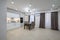 Large modern new well designed white kitchen in studio flat interior