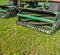 Large motor mower mows green grass