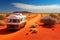Large motorhome bus driving in the arid Australian outback. Red dirt road. Lap of Australia