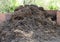 A large mound of rich organic brown mulch for landscape