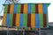 Large multi-colored mobile apiary for 48 hives. wooden house for bees.