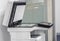 Large multi functional printer standing in office for use in copying, scanning