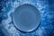 Large Navy Blue plate on blue rustic background