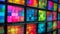 A large number of television screens are shown in a pattern, AI