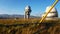 A large observatory is protected by a barbed fence