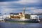 The Large Oceanic Icebreaker  in the fairway of the river in the city center, surrounded by attractions on the neva river