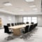Large office room with tables and chairs with blurred image