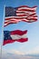 Large official Flag of US and Confederate States of America May 1861 - July 1861 state, Usa at cloudy sky background. United