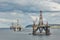 Large offshore oil rig drilling platforms off the coastline near Invergordon in Scotland