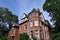 large old three story brick houses with gables