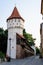 Large old white painted stone tower in the historical center of the Sibiu city, near Citadel Street and Park Strada si Parcul