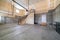 Large open plan concrete basement interior garage