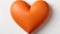 A large orange heart shaped object on a white surface, AI