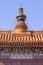 Large ornamented object on rooftop of a building, Buddhist temple, Beijing, China