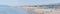 Large panorama of the beaches and seaside resorts of Marina di Carrara, Tuscany in Italy after anti-covid-19 measures