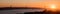 Large panoramic view of Amazing sunset on Ponte 25 de Abril Bridge, 25th of April Bridge at Lisbon