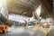 Large passenger aircraft on service in an aviation hangar rear view of the tail, on the auxiliary power unit. Mechanization of the