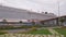 Large passenger cruise ship is moored in sea port in daytime, panoramic shot