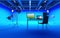 Large Pavilion Interior of Modern Film Studio with Blue Screen and Light Equipment.