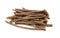 Large pile of liquorice root sticks