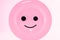 Large pink plate with a happy smiling face