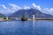 A large pirate ship enters the port between two lighthouses in Alanya Turkey. Beautiful seascape of the bay in the resort town