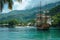 A large pirate ship, with sails unfurled, anchors in a tranquil Caribbean cove surrounded by lush greenery and a clear