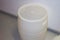 Large plastic white barrel of high-pressure polyethylene. Plastic production