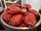 A large plate of boiled spanner crab in a seafood restaurant.