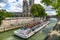 A large pleasure boat floats on the river Seine