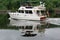 Large pleasure boat making it`s way down section of the Erie Canal, New York, 2018