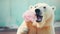 A large polar bear holds a waffle cone with