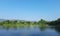 Large Pond with Hill Behind