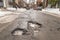 Large potholes in Montreal street, Canada