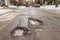 Large potholes in Montreal street, Canada