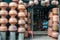 Large pots and utensils piled outside a shop