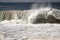 Large powerful wave curling in the ocean