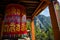 Large prayer wheel in buddhist temple in Bhutan