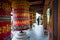 Large prayer wheel in buddhist temple in Bhutan