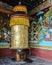 Large prayer wheel for good karma at the Punakha Dzong in Bhutan