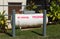 Large propane tank in landscaped garden