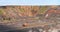 Large quarry dump truck aerial view