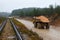 Large quarry dump truck. View of the large sand pit. Production useful minerals. Loading the rock.