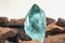 Large quartz crystal on white background close-up