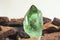 Large quartz crystal on white background close-up