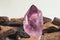 Large quartz crystal on white background close-up