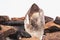 Large quartz crystal on white background close-up