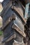 Large rear tire of an old tractor closeup