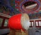 Large red drum decorated inside Chinese temple