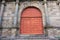 Large red european doorway church entrance in Rennes France